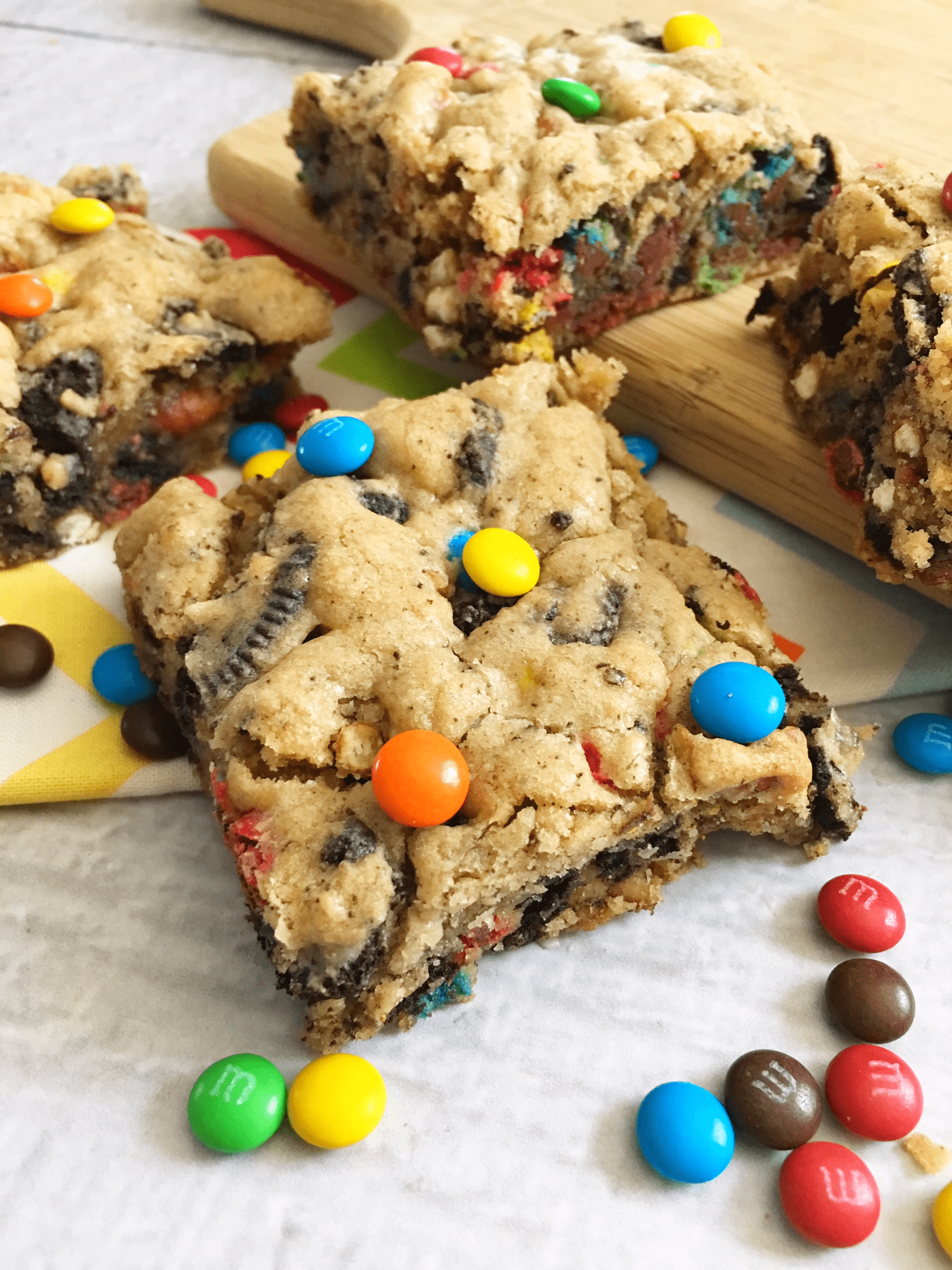 This Monster Cookie Recipe will make your little cookie monsters happy!! Make cookie bars for faster prep and easier cleanup!